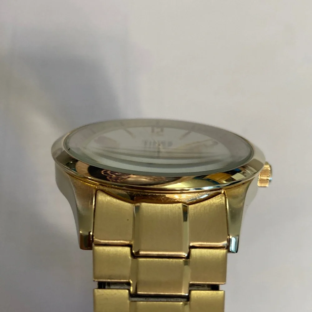 Timex gold tone Perpetual Calendar watch, stretch bracelet, new battery, indiglo
